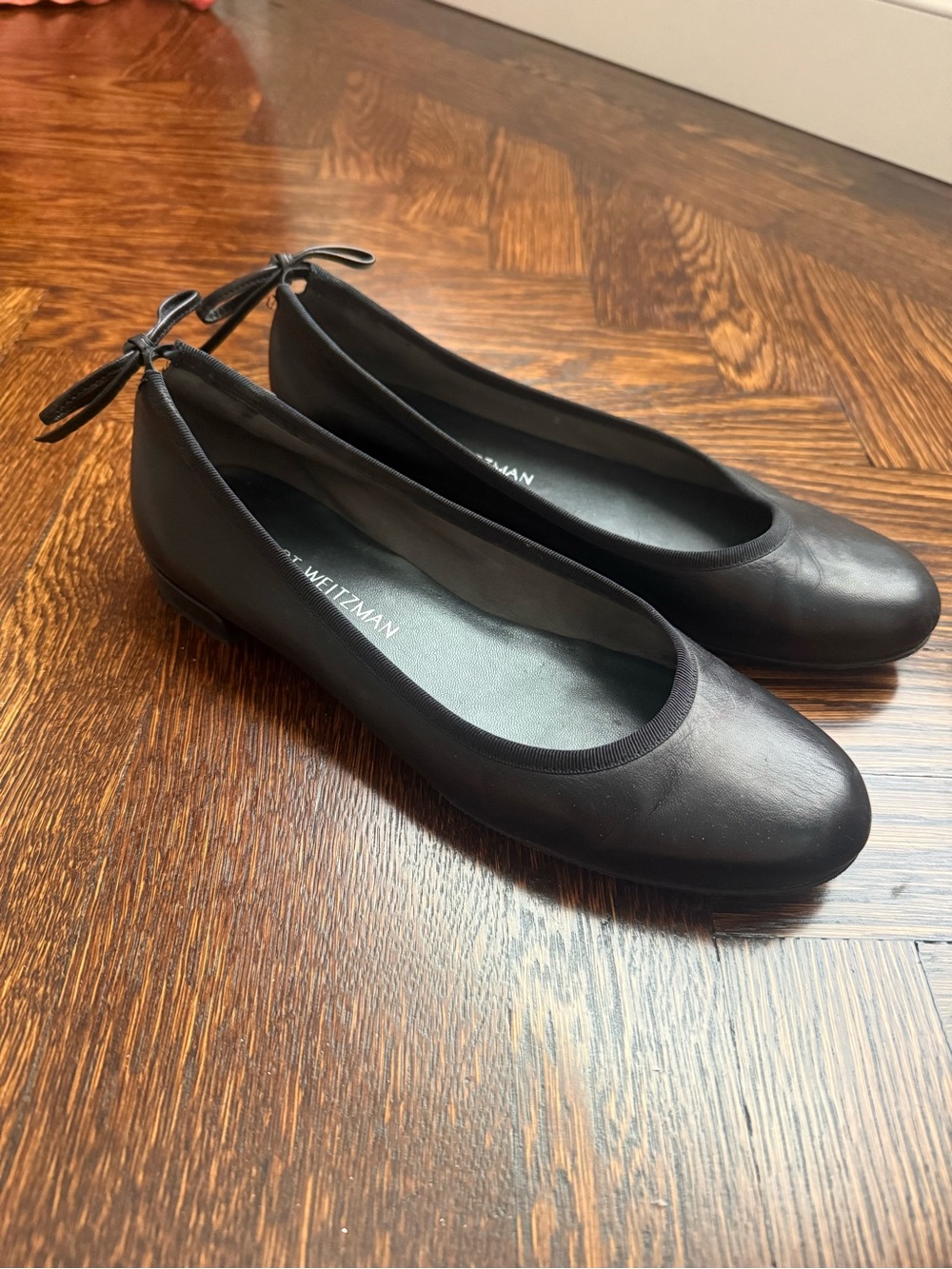 Stuart Weitzman Black Leather Ballet Flats with Bow Detail on Heel